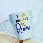 10 Oz White Ceramic Mug - Might Be Rum